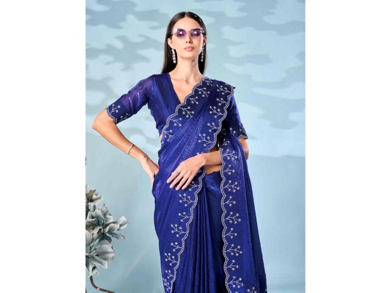 Royal blue colored satin saree with heavy work
